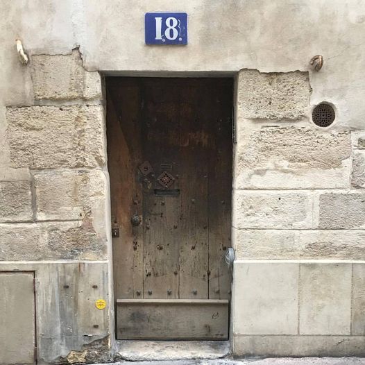 French Number 18 - A very old Paris door on the edge of the Latin Quarter, one of the oldest part of Paris
